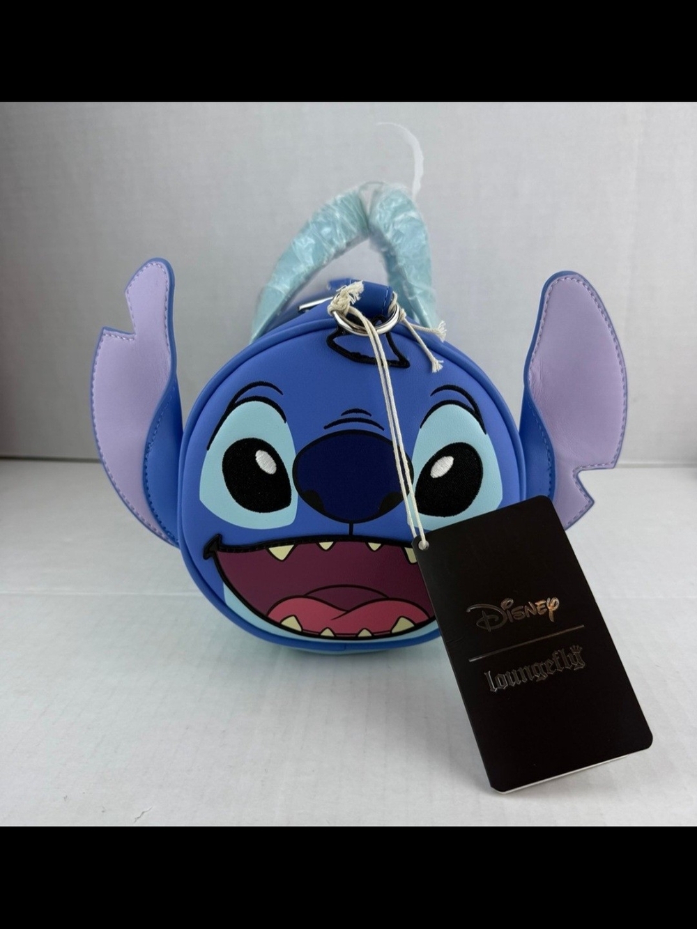 Loungefly Kids Stitch Face Crossbody Bag in Blue and Purple